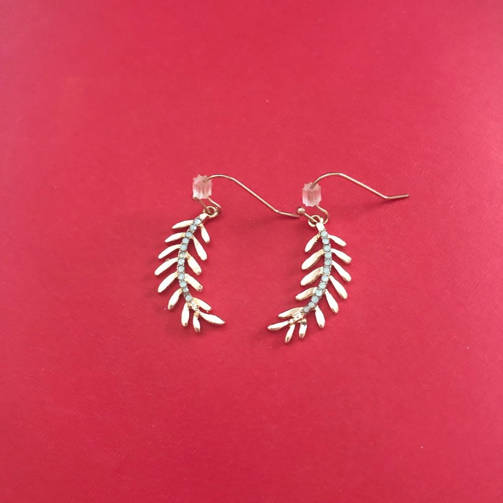 Palm leaf gold drop earrings.